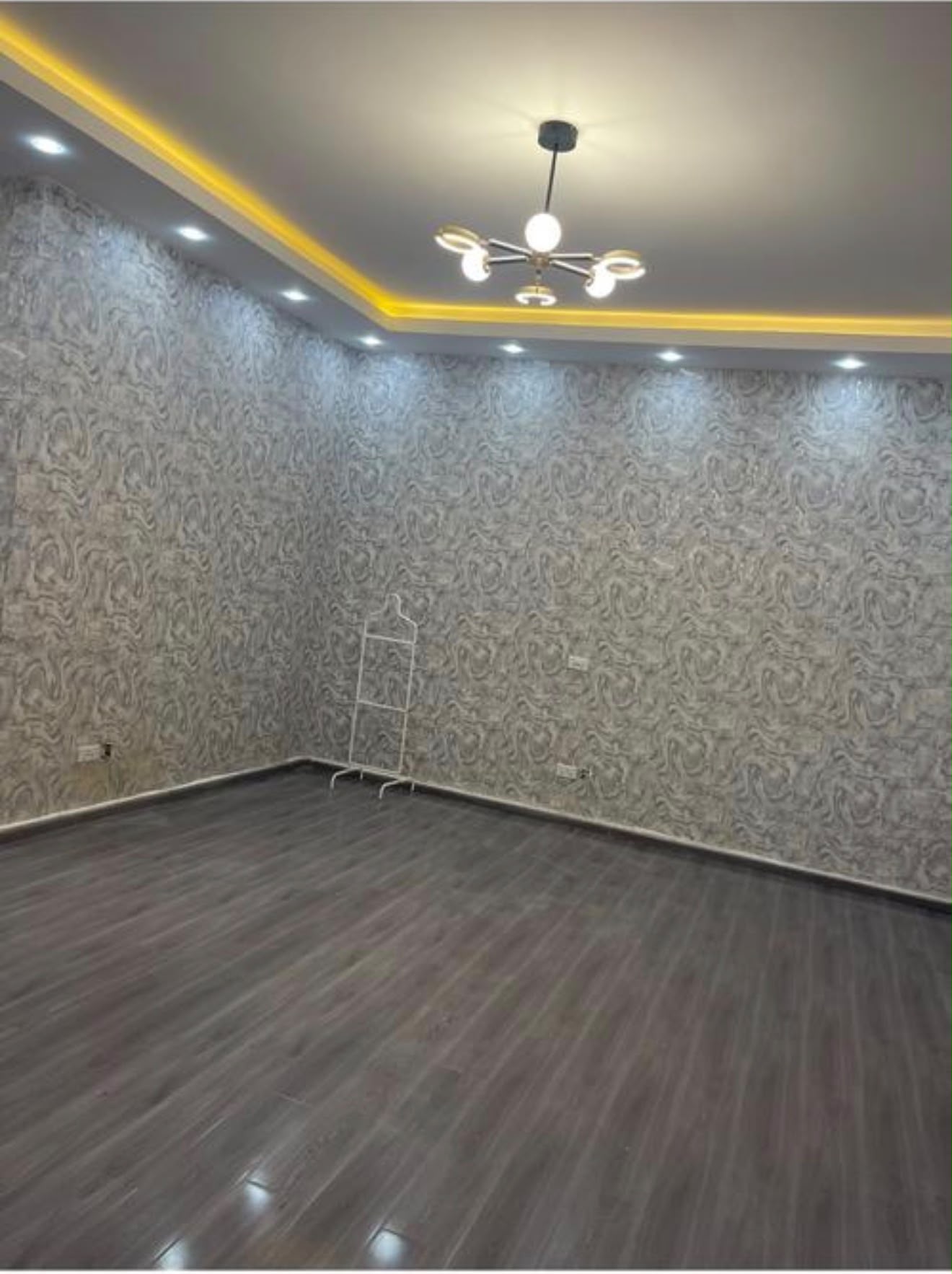 Finished interior with cove lighting