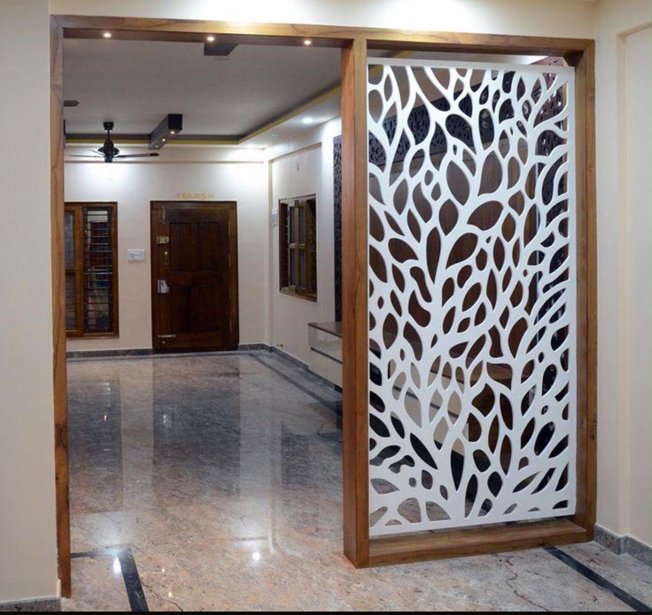 Custom architectural screen in a residential entrance